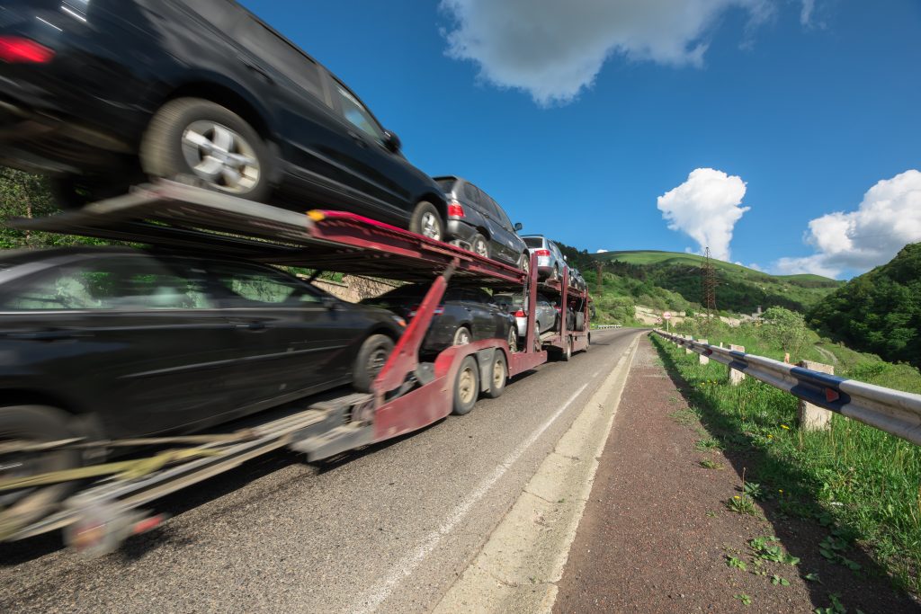 Transport trailer carrying cars